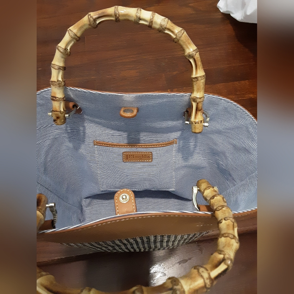 J. Mclaughlin straw and leather bag.  Bamboo handles.  Excellent condition.